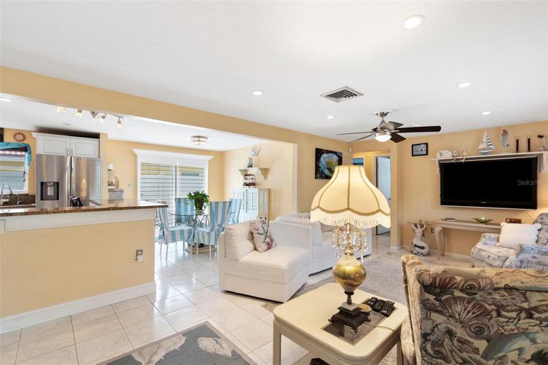 From the front door, enter into the living room and kitchen for an open floor plan.