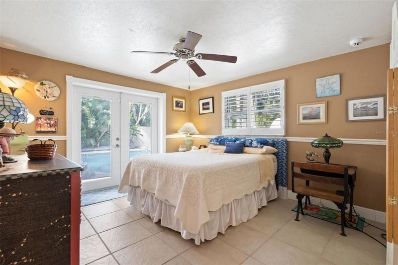 Bedroom #2 has French doors walking out to the pool and spa