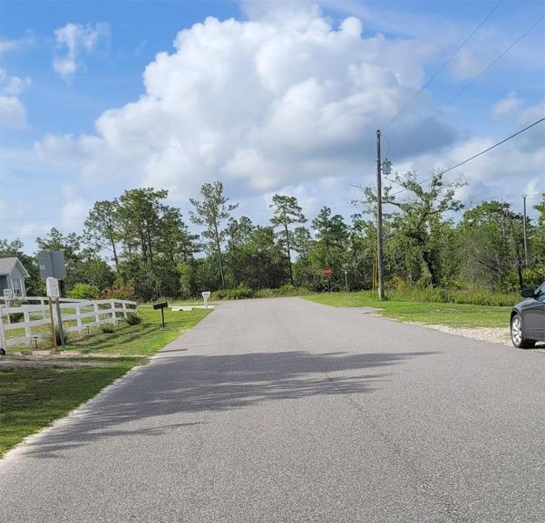 View down the road from vacant lot