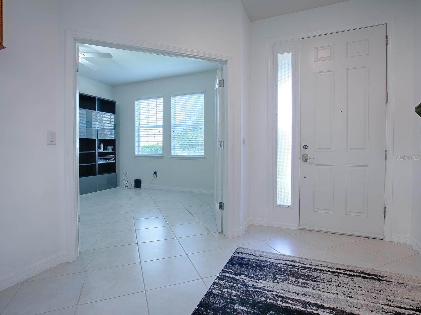 Office with glass doors provide a nice separation if needed!