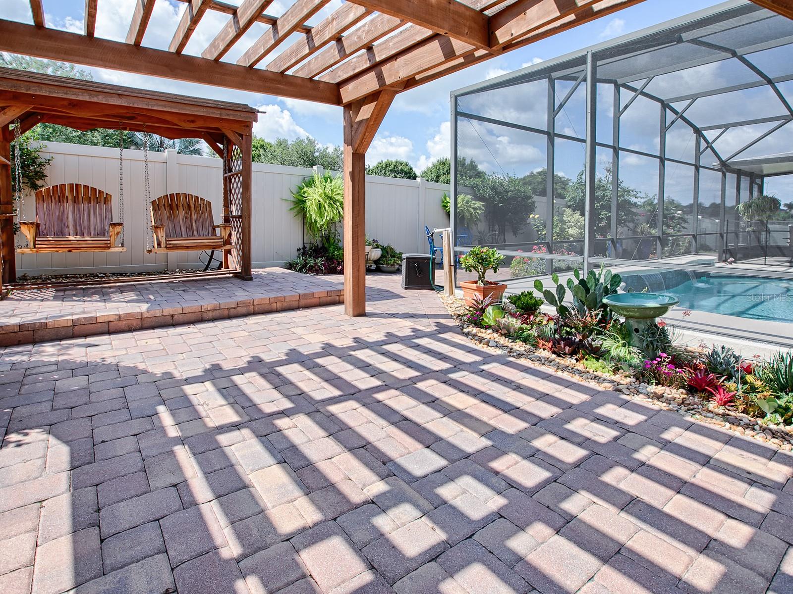 Sweet Swinging!  Notice the absolutely gorgeous succulent garden!!