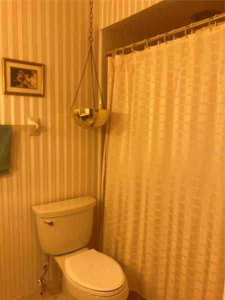 Another view of family bath with tub/shower.