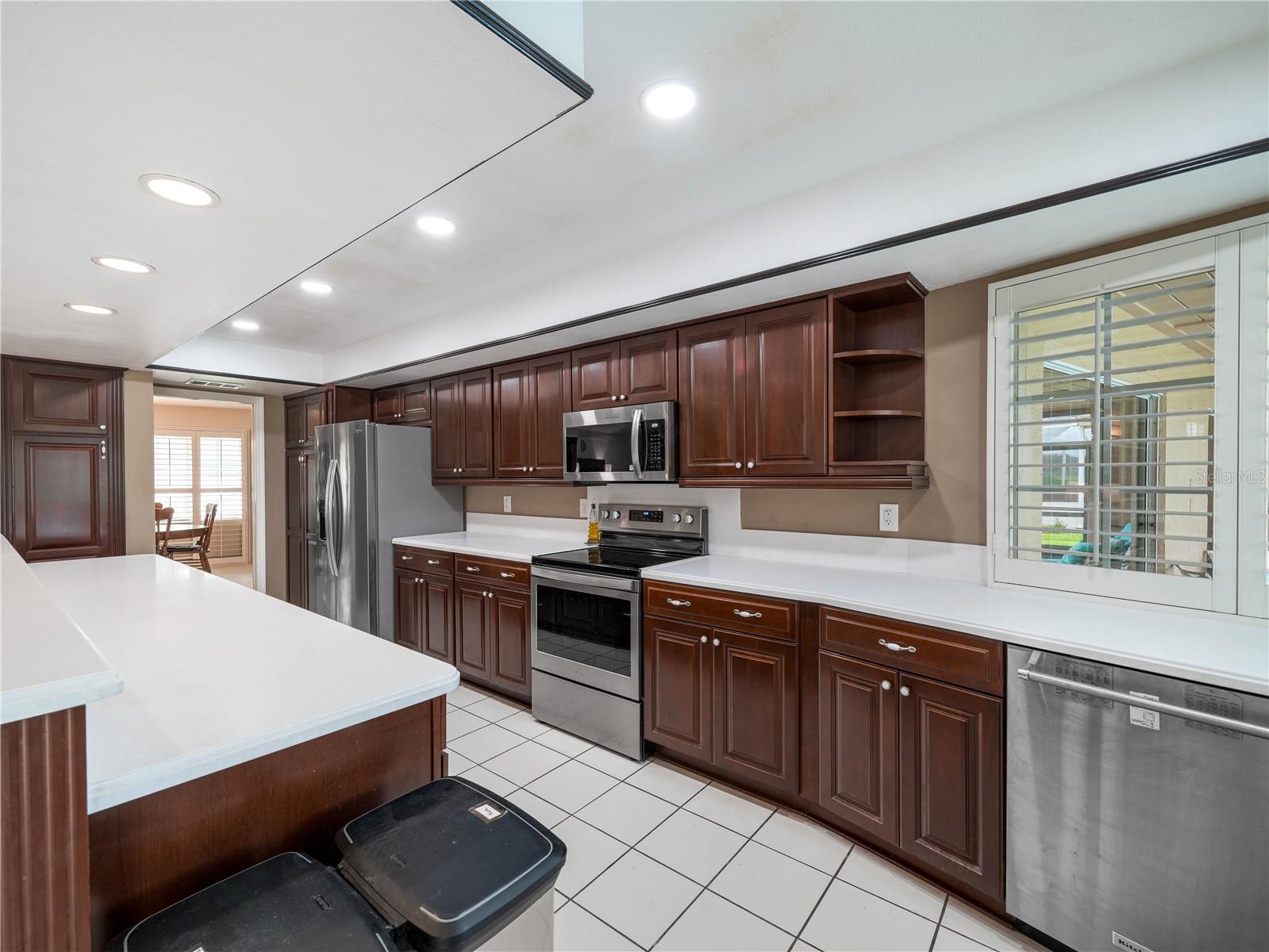 Corian countertops, stainless steel appliances
