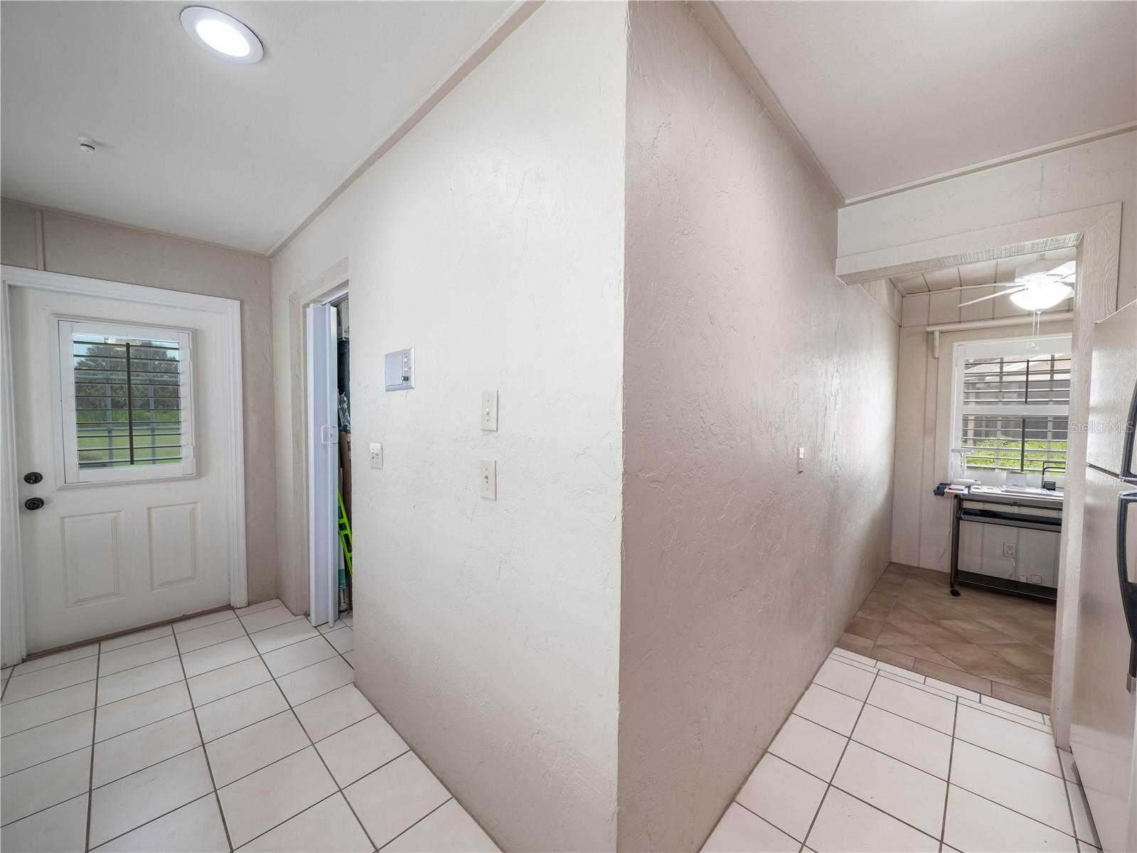 Back entry door to in-law suite w/large 11x14 room for storage or room for In-Law Suite