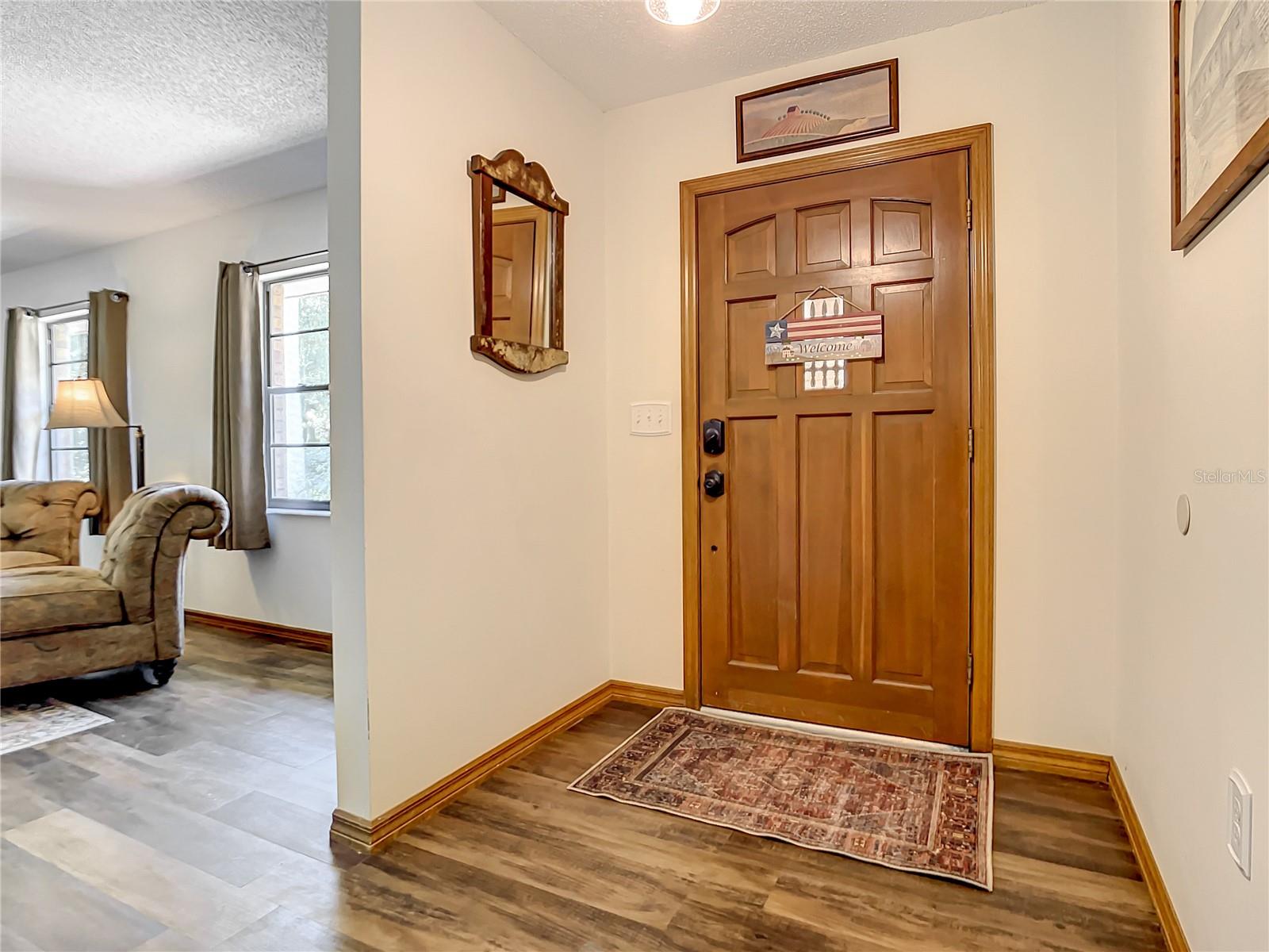 Front door and partial view of second living room