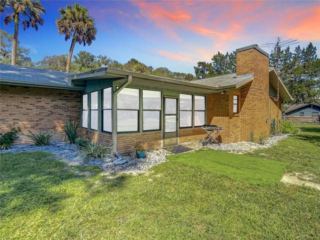 Back of the home, enclosed porch