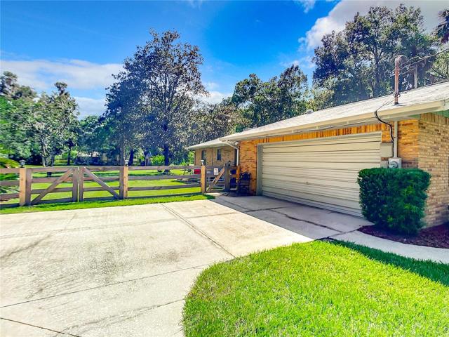 Concrete Driveway to Large Garage