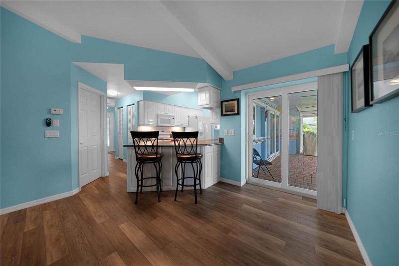 Living room view into dining space