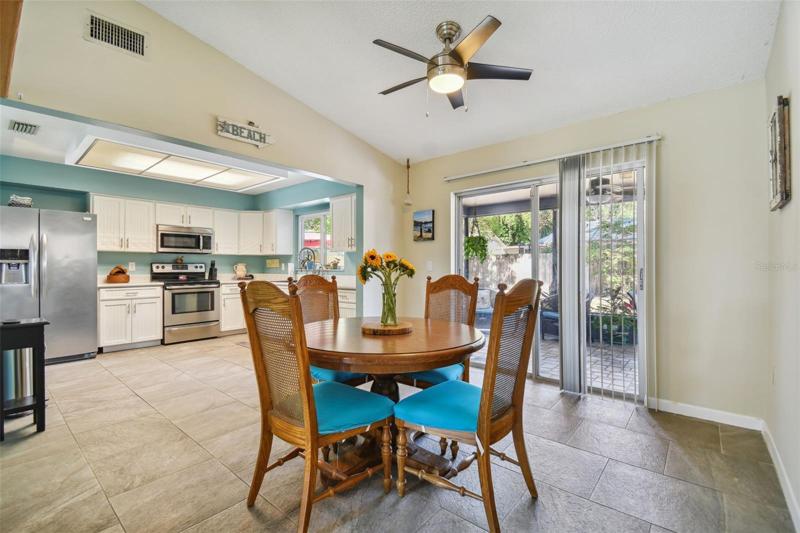 Dining room area with access to the screened patio area.