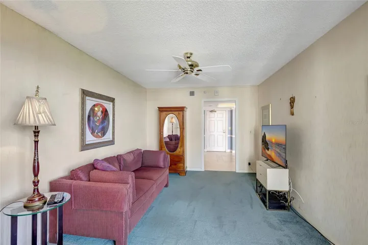 3rd Bedroom presently enjoyed as a Den. Accessed from Foyer, and from 75'balcony.