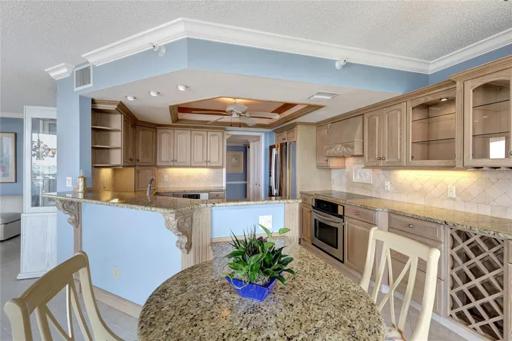 Custom Granite Breakfast table with desk drawers to the side.