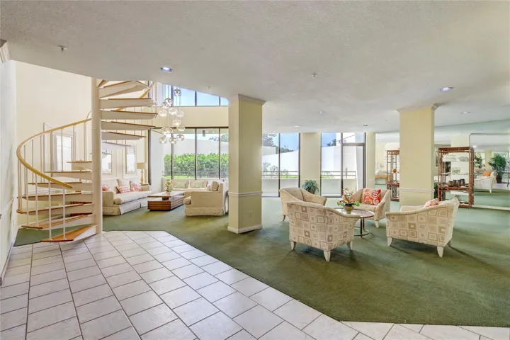 5940 Entry Lobby with stairs to Mezzanine rest rooms, party & function rooms. Or ride either of 2 elevators.