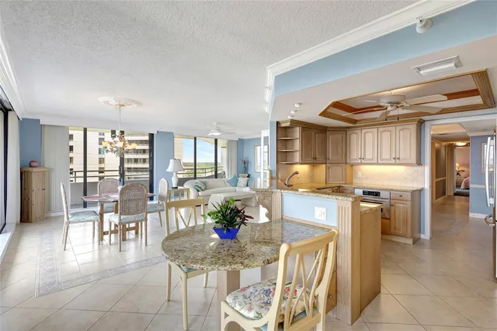 Crown moldings, coffered ceiling, custom wood cabinetry, many extra builtins. Access to 75' wrap around balcony, great water views.