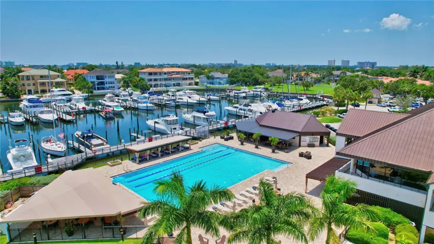 82 deep water boat slips, purchase or  lease when available, Jr Olympic pool, Pool Bar restaurant, rest rooms & showers with Membership.