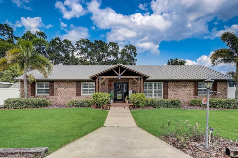 This home sings like a beautiful canary and must be experienced in person to truly appreciate the stunning upgrades that include a RENOVATED KITCHEN & BATHS, huge lot with a SCREENED POOL and UPGRADED METAL ROOF, zoned for BOONE HIGH SCHOOL!
