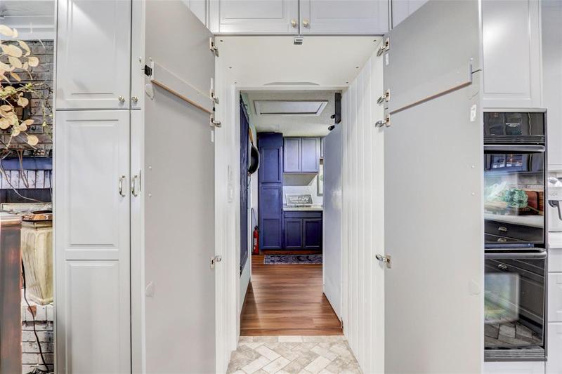 HIDDEN PANTRY that leads to your utility/laundry room!