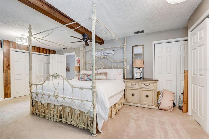 The generous primary suite is a true retreat with large windows, endless closet space and en-suite bath!