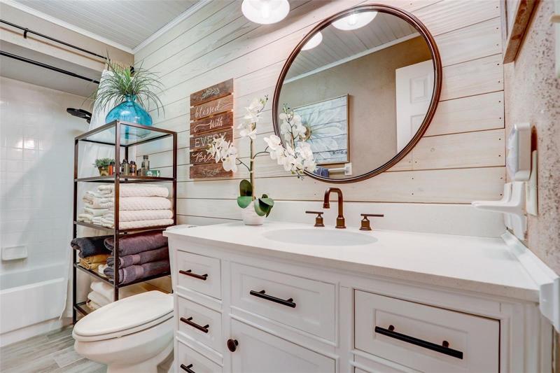 The two other bedrooms share a second full bath, also updated in the same finishes that set this home apart from any other!