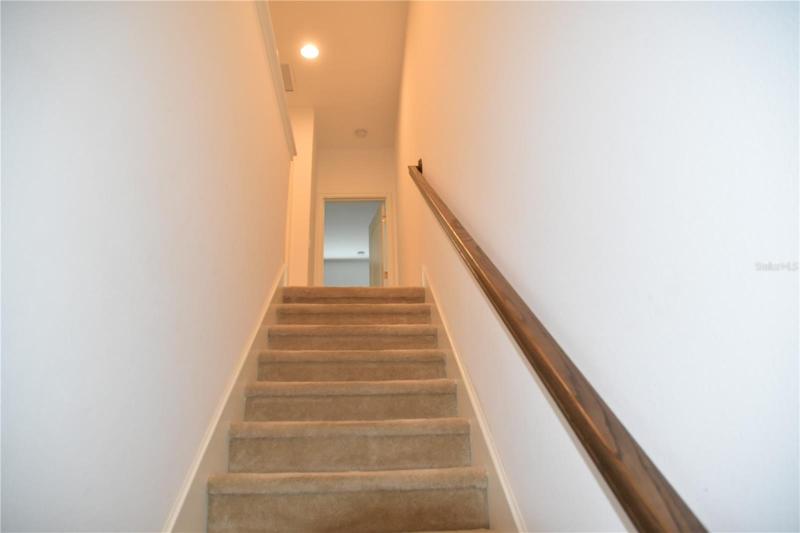 Stairwell to your double master bedrooms!