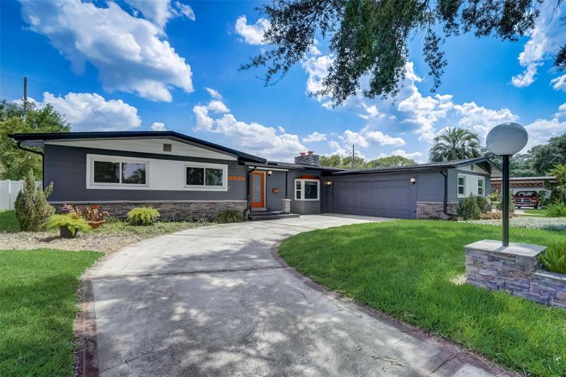The Dover Shores community just 2 miles from Downtown has a must see 3-bedroom, 2-bath **RENOVATED** gem with a NEW KITCHEN and BATHROOMS, UPDATED ROOF (2018 - new fascia/soffits/gutters 2023!) and a fresh modern vibe that you will fall in love with from the moment you step through the front door!