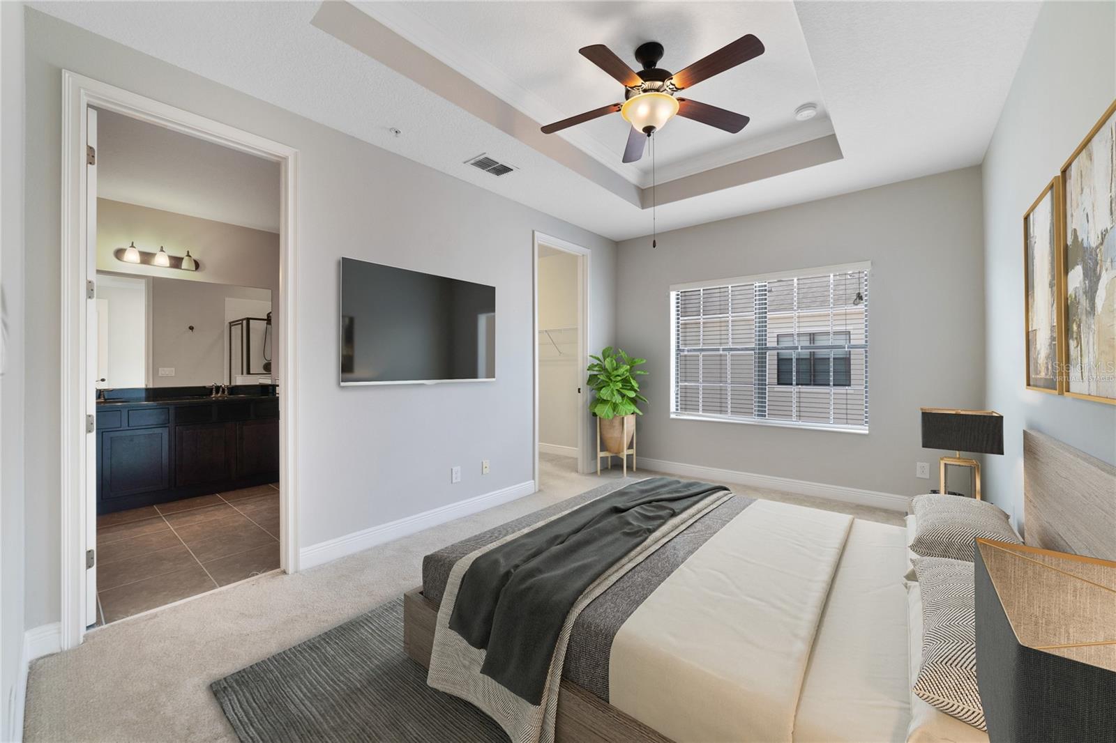 Head up to the third floor to check out the remaining bedrooms including your PRIMARY SUITE, a generous space with a decorative tray ceiling finished with crown molding, a large window for great natural light, walk-in closet and private bath! Virtually Staged.