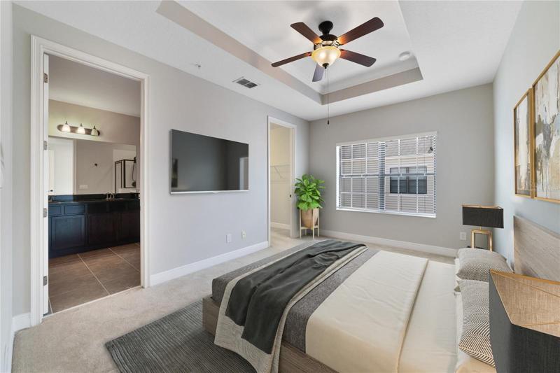 Head up to the third floor to check out the remaining bedrooms including your PRIMARY SUITE, a generous space with a decorative tray ceiling finished with crown molding, a large window for great natural light, walk-in closet and private bath! Virtually Staged.