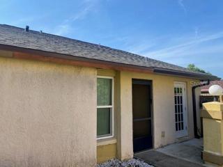 Welcome home to 12143 SAND PEBBLE WAY with a brand new roof and gutters!