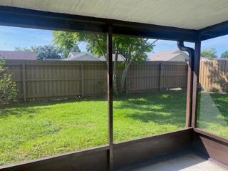 The covered and screened patio.