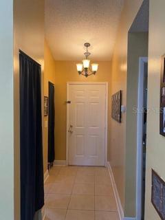 The kitchen is on the left and guest bedroom is on the right (in this photo).