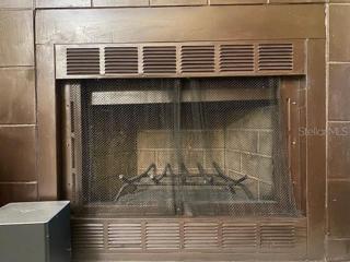 The wood burning fireplace.