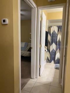 The hallway to the guest bedroom and bathroom.