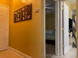 The front hallway leading to the guest room.