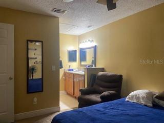 The master bedroom leading to the bathroom.