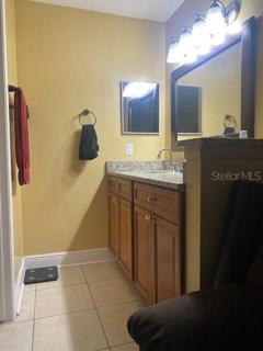 Granite countertop is located in the bathroom.