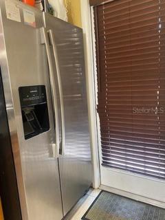 The stainless steel double door refrigerator.