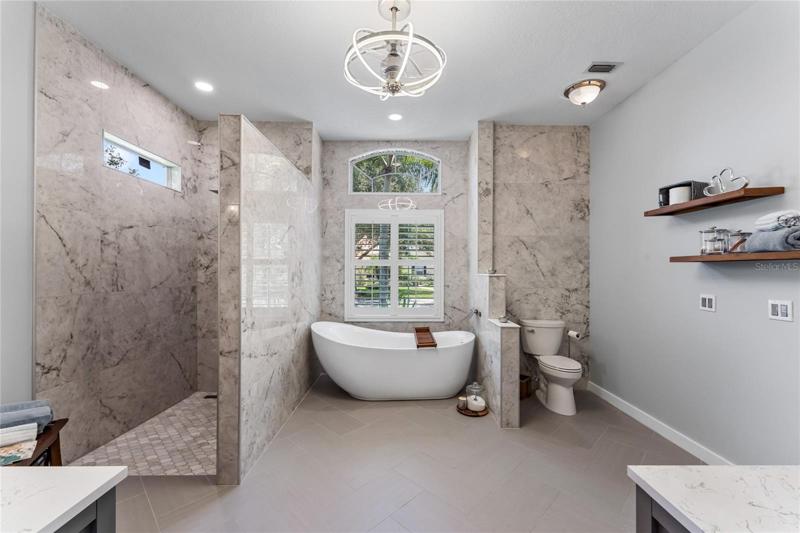 The master bedroom features a truly spa-like ensuite master bath. Recently updated, you'll love this space for rest and tranquility.