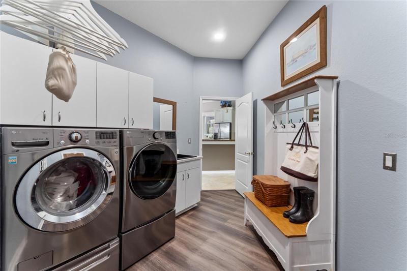 This home features an expansive laundry room located just off the garage access. It also features access tot he ensuite guest suite for multigenerational living.