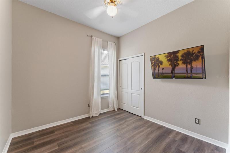 View of the guest suite located off the laundry room.