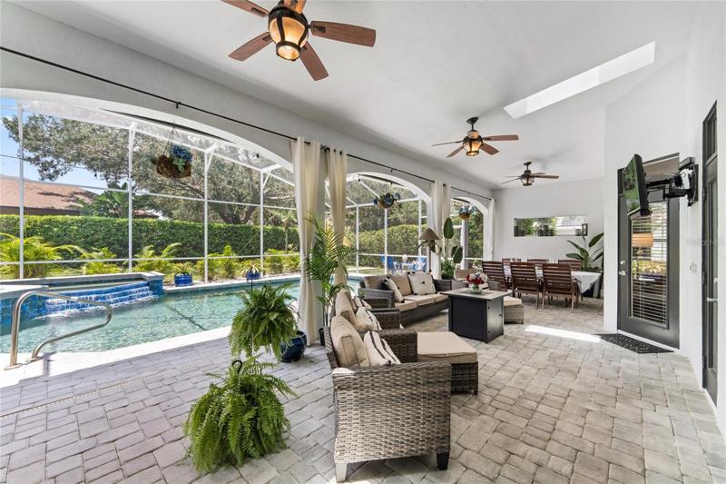 This home is perfect for outdoor entertaining with a covered lanai and ceiling fans.