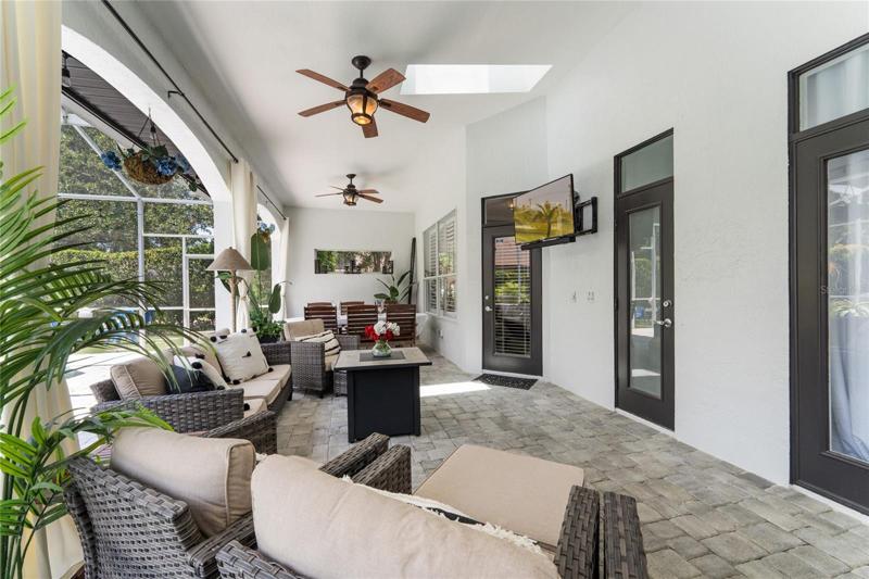 This home is perfect for outdoor entertaining with a covered lanai and ceiling fans.