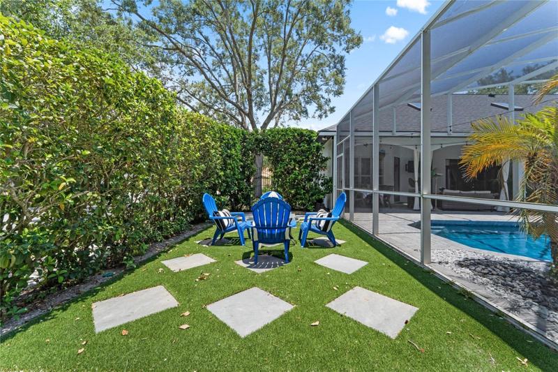 This home features a peaceful lawn area for evening cocktails or perhaps a fire pit.