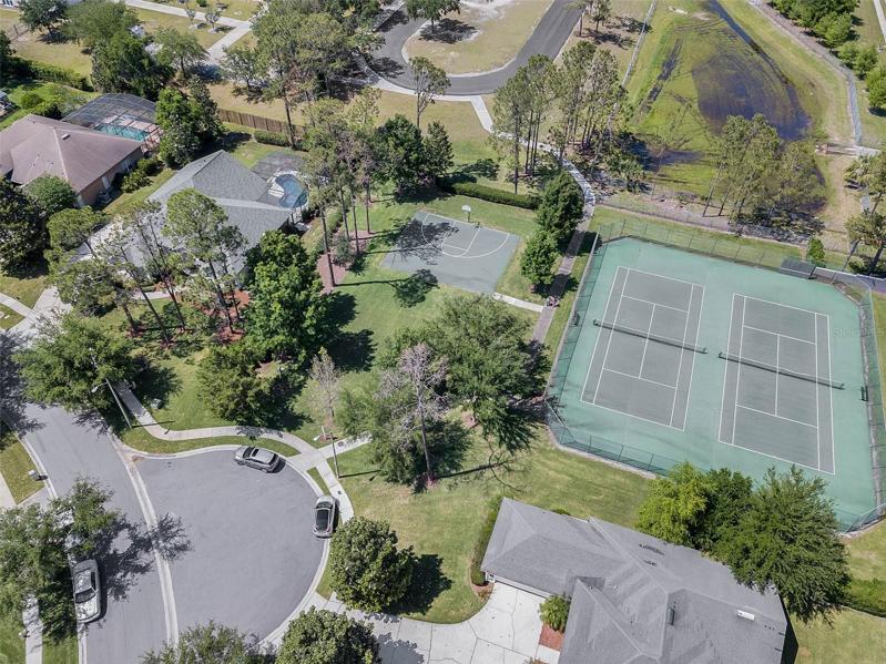 The walkway between the tennis courts and the basketball court takes you to Bay Meadows Elementary School.