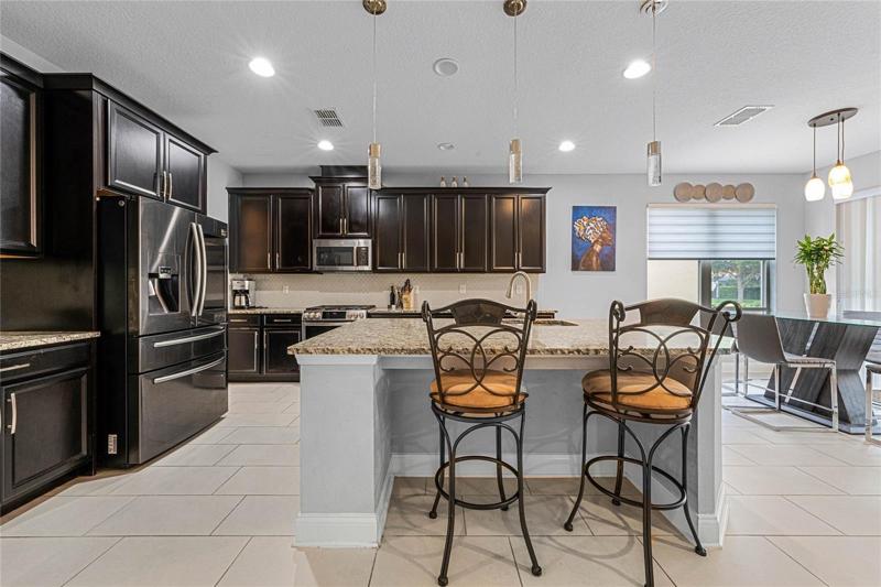 Other view of kitchen with breakfast bar