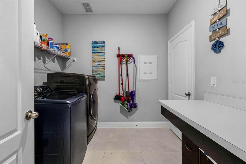 Large laundry room with access to the 3-car garage