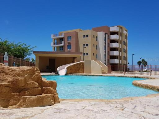 Pool View to Balcony - Front View Building Site