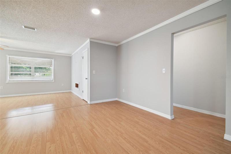 Dining area/Family Room with entry to hall bedrooms