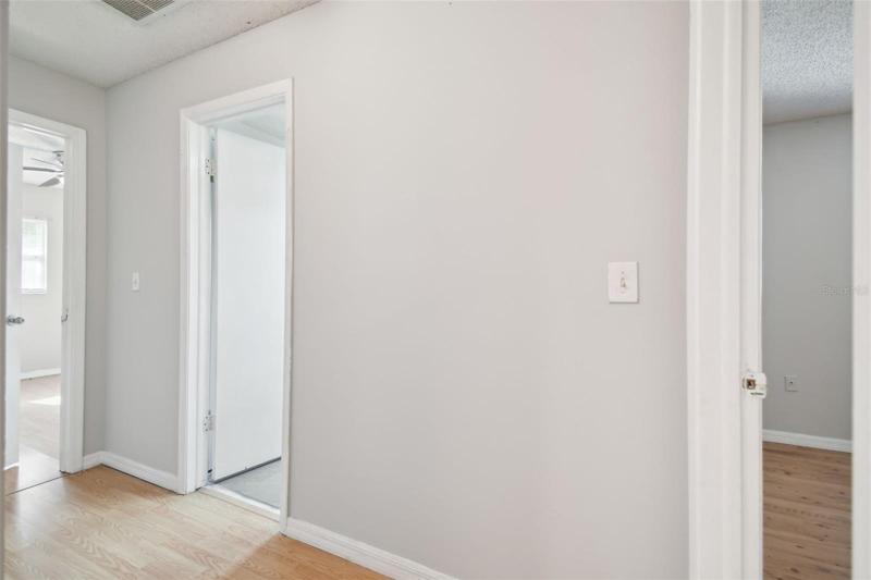 Hallway to 2 other bedrooms