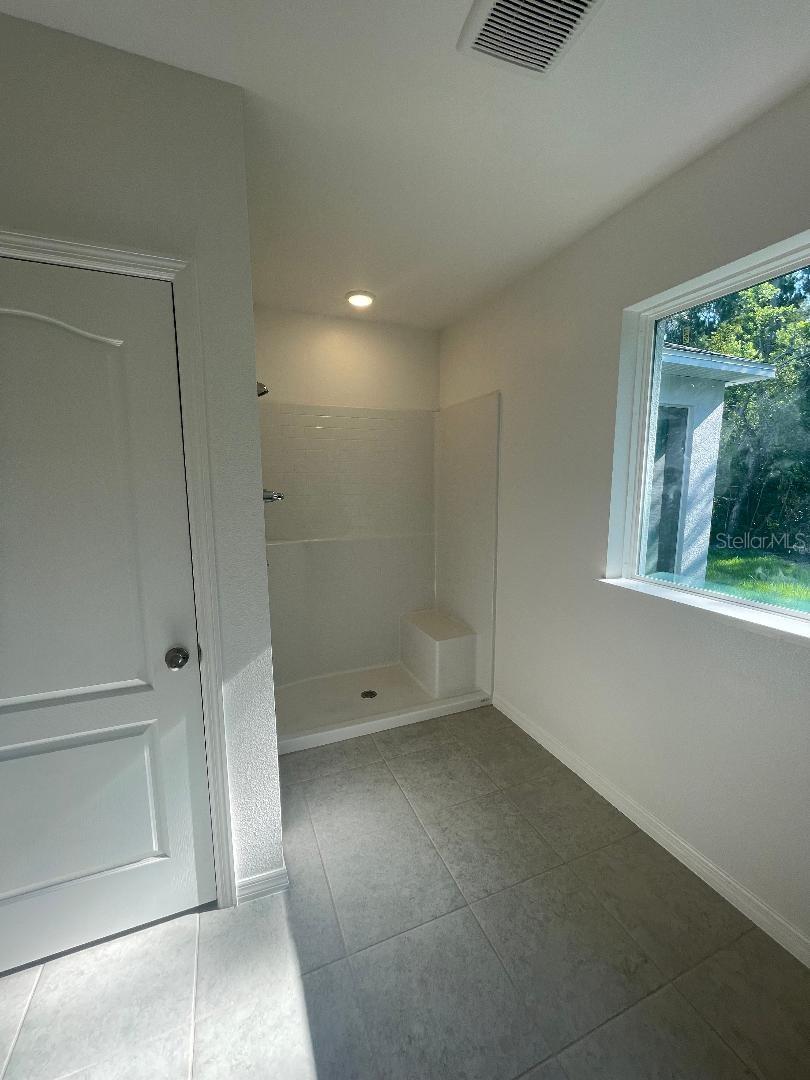 Owner's en suite shower and private toilet
