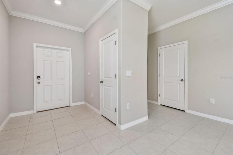 Foyer with Coat Closet and 1st Floor 1/2 Bath