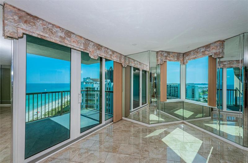 Step through the Sliders onto your Gulf front Wraparound balcony